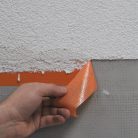 Blue Dolphin odstránenie vonkajšej omietkarskej pásky po omietaní – presná, čistá hrana bez zvyškov lepidla